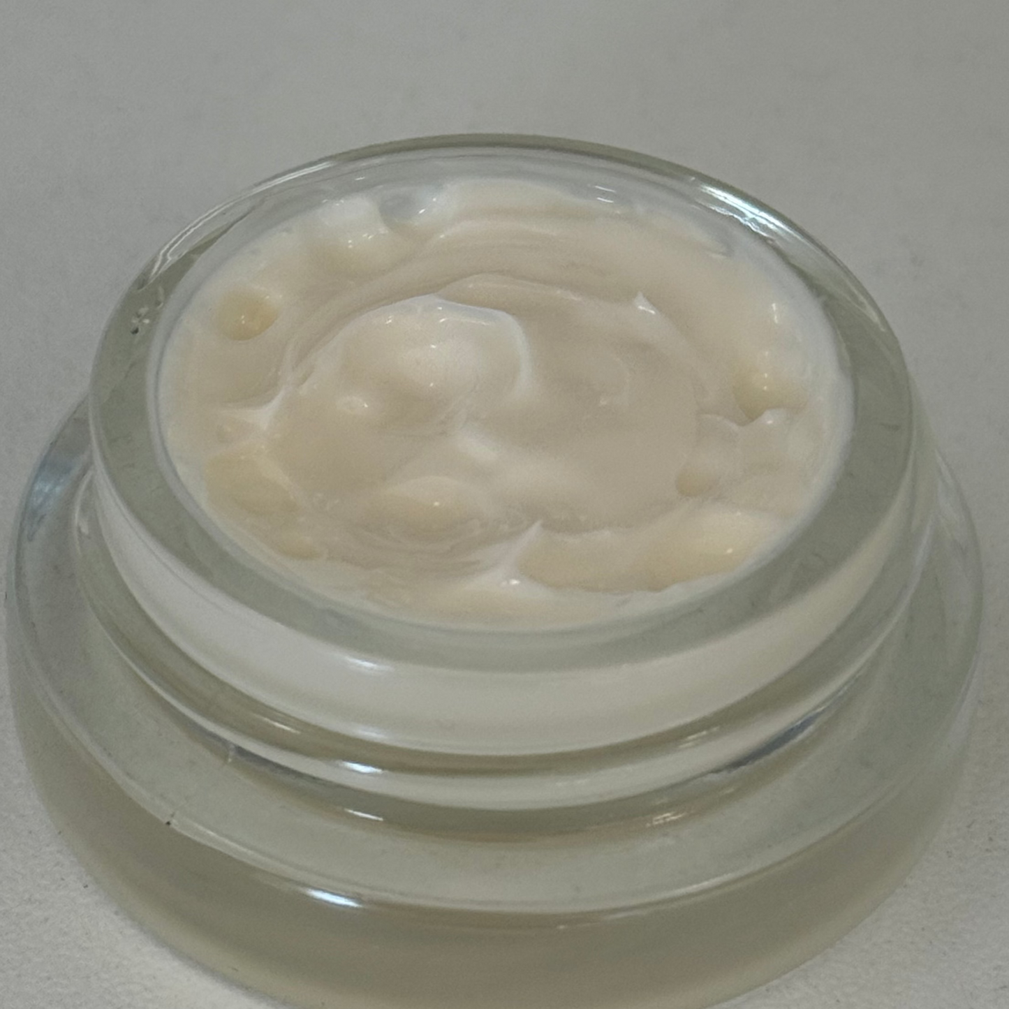 close up of the epicutis hyvia creme moisturizer showing the texture, thickness, and consistency of the moisturizer
