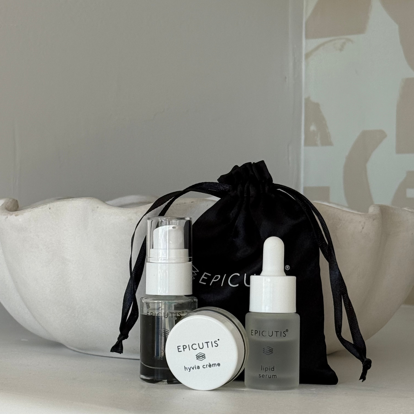 Epicutis mini 3 piece travel set featuring epicutis oil cleanser travel size, epicutis lipid serum travel size, and epicutis hyvia creme travel size