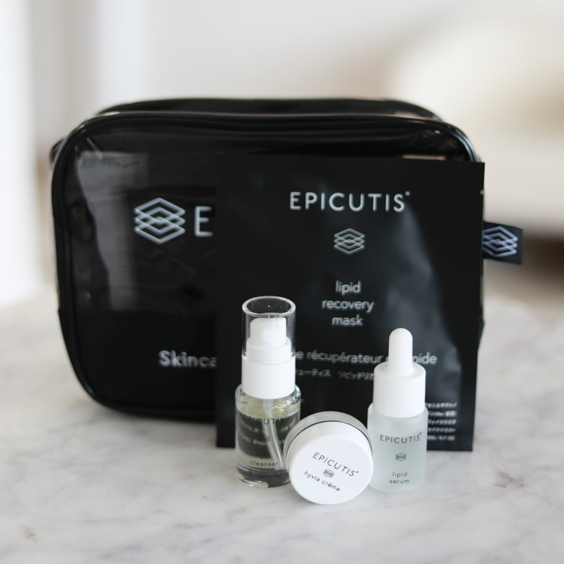 Epicutis Post Procedure Kit featuring epicutis oil cleanser travel size, epicutis lipid serum travel size, epicutis hyvia creme travel size, and lipid recovery mask