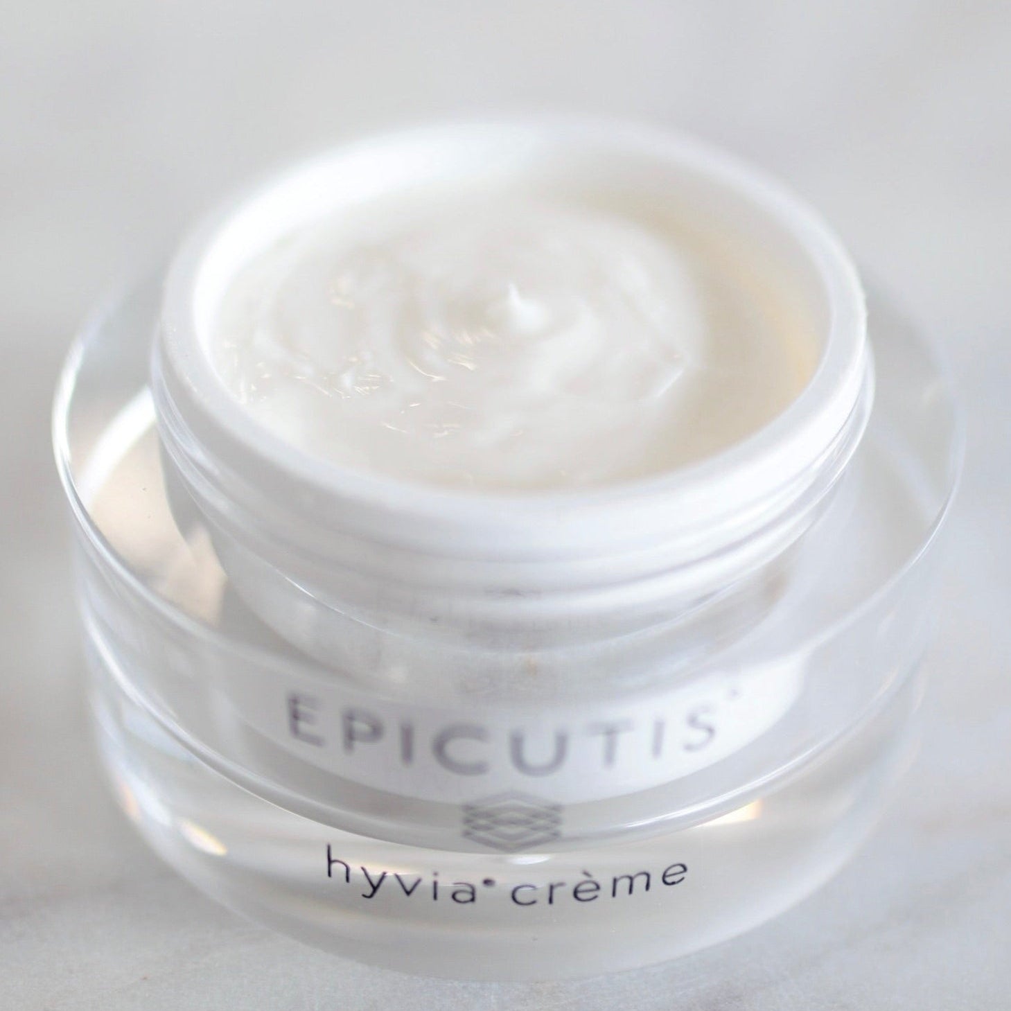 Epicutis Hyvia Crème on a clean surface at Clover Skin Bar. Hyvia Creme is a hydrating shea butter moisturizer designed to strengthen the skin barrier and relieve dryness.