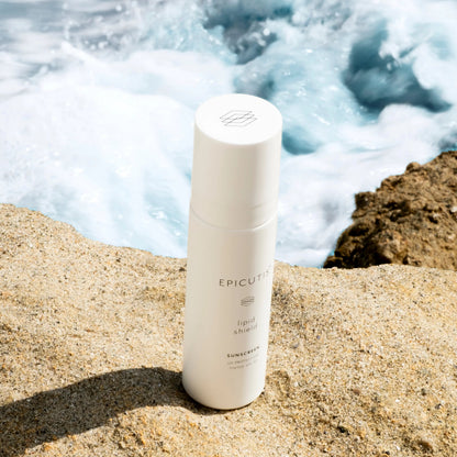 Epicutis Lipid Shield SPF 30 on a rocky surface with ocean waves in the background